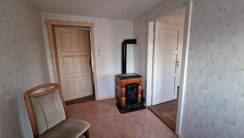 Zimmer mit Kaminofen - 