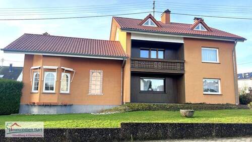 Seitenansicht - 9 Zimmer Einfamilienhaus zum Kaufen in Orscholz