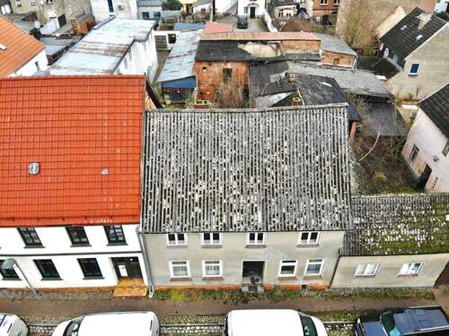 Ansicht Straßenseite - Mehrfamilienhaus, Wohnhaus mit 109,10 m&sup2; in Gnoien zum Kaufen