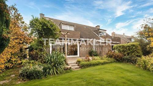 Terrassenansicht - FAMILIEN-WOHN(T)RÄUME: Großzügige Doppelhaushälfte mit Keller & Sauna