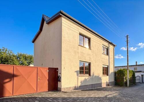 Objektansicht - Wohnen in Bestlage von Mühlbeck Einfamilienhaus mit zwei Bädern, Gartengrundstück und in Seenähe