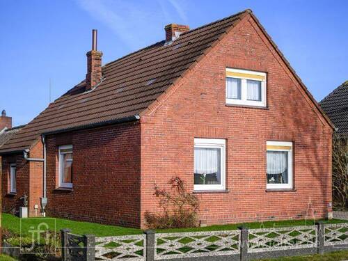 Aussenansicht - Hinter dem Haus der Deich, nach vorne weites Land...