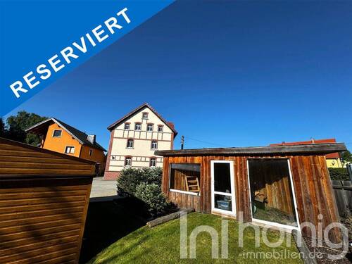 Blick auf das Haus - Voll vermietetes MFH mit einzigartiger Eigentümerwohnung von 140m² am Rande von Löbau