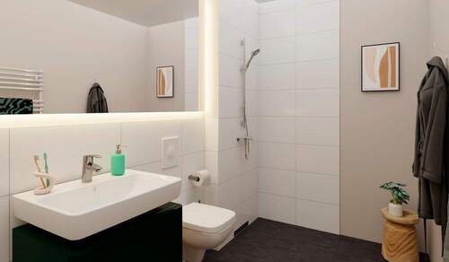 Ein modern gefliestes Badezimmer - 2 Zimmer Etagenwohnung in Hasloh