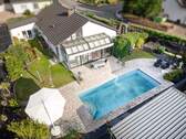 DJI_0378_LuminarNeo-edit-Bearbeitet - Großzügiges Grundstück + Wunderschöner freistehender Bungalow in ruhiger Lage zu verkaufen + Pool Garten + Garage + Wintergarten