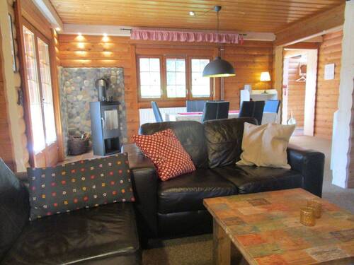 207. Wohnzimmer mit Kaminofen im EG.des Ferienhaus - 