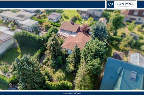 Titel - Idyllisches Einfamilienhaus mit Wintergarten und großzügigem Grundstück in Berlin-Blankenburg