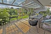 Terrasse mit Blick in den Garten - Doppelhaushälfte mit 158,00 m² in Raubling zum Kaufen