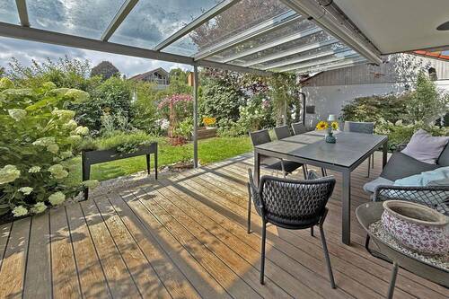 Terrasse mit Blick in den Garten - Doppelhaushälfte mit 158,00 m² in Raubling zum Kaufen