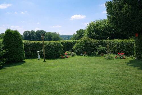 Blick in den Garten - 2 Zimmer Mehrfamilienhaus, Wohnhaus in Scharbeutz