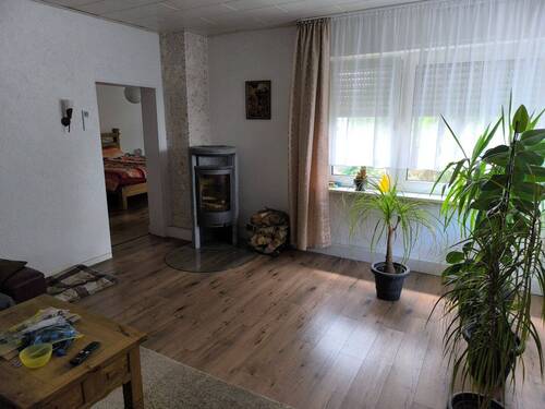 Obergeschoss Wohnzimmer mit Kamin - 