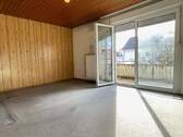 Wohnzimmer mit Balkon - 