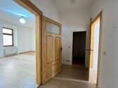 Erdgeschosswohnung mit Balkon - 