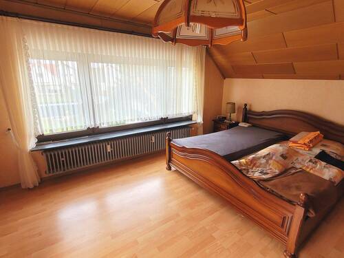 Schlafzimmer im Dachgeschoss - 