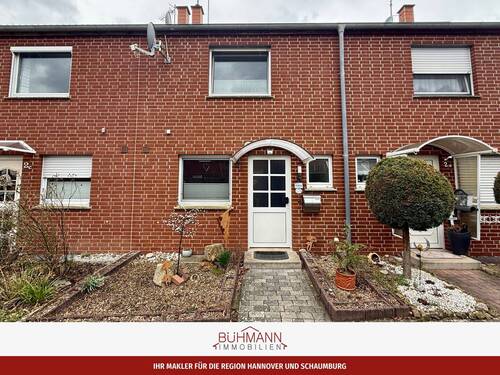 Titelbild - 31553 Sachsenhagen - Reihenmittelhaus mit Garage und Grundstück