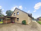 Rückansicht - 7 Zimmer Mehrfamilienhaus, Wohnhaus zum Kaufen in Loxstedt