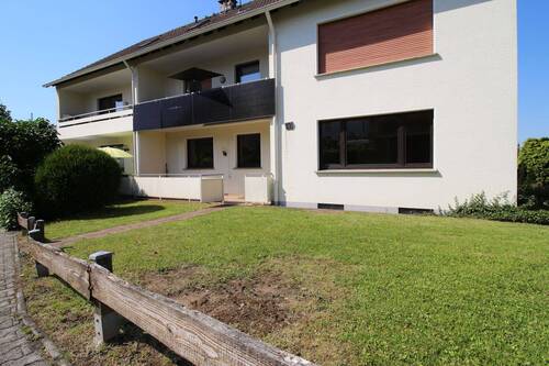 Außenansicht - Lebensqualität – sonnige und großzügige Erdgeschosswohnung mit Terrasse und Garage in ruhiger Wohnlage