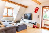 Das Wohnzimmer mit Balkon - Großzügige 2-Zimmer-Maisonette-Wohnung in Wehr