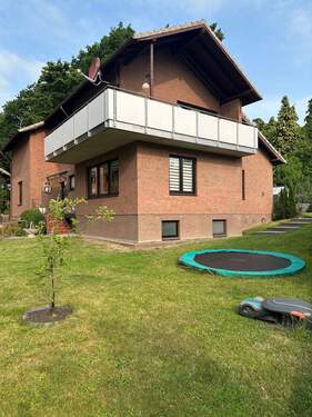 Straßenansicht - 6 Zimmer Mehrfamilienhaus, Wohnhaus zum Kaufen in Dollern