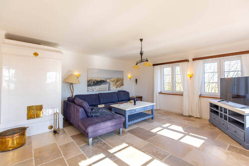 Wohnzimmer mit Kachelofen - 