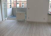 Wohnzimmer mit Balkon - 2 Zimmer Etagenwohnung zum Kaufen in Plauen