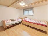 Schlafzimmer im Erdgeschoss - 