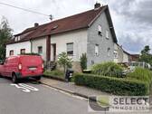 Ansicht - Aus Bankverwertung! Einfamilienhaus mit Garten und 2 Garagen in ruhiger Lage