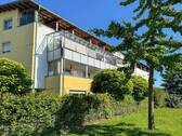 Außenansicht - Gepflegte 2-Zimmer-Erdgeschosswohnung mit Terrasse und Tiefgarage