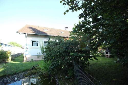 Gartenansicht - Mehrfamilienhaus, Wohnhaus mit 150,00 m&sup2; in Hüfingen zum Kaufen