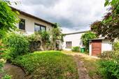 Objektansicht - Einfamilienhaus mit Garage, Nebengelass und großem Grundstück