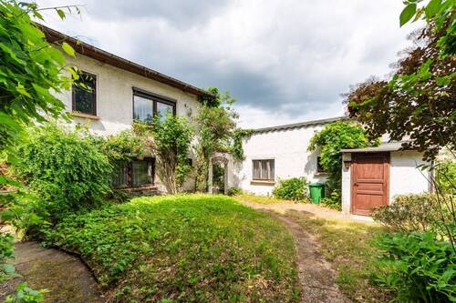Objektansicht - Einfamilienhaus mit Garage, Nebengelass und großem Grundstück