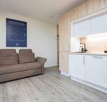 Achtung: Erstbezug! Mitten im Zentrum von Neusäß - Gartenwohnung + Tiefgaragenstellplatz