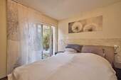 Schlafzimmer mit Terrassenausgang - 