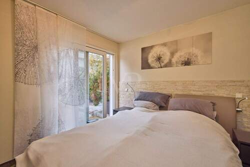 Schlafzimmer mit Terrassenausgang - 