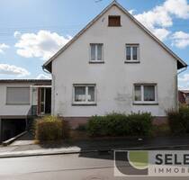 Freistehendes Ein- bis Zweifamilienhaus mit Garten und Garage - Ottweiler / Fürth