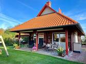 überdachte Terrasse - Einfamilienhaus mit 123,00 m&sup2; in Feldhusen zum Kaufen