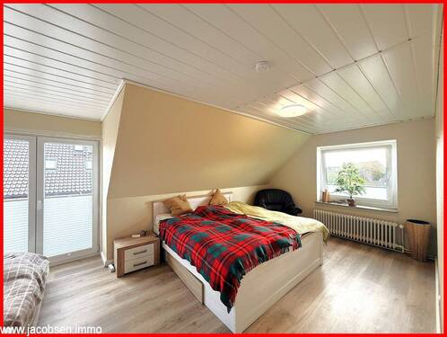 Schlafzimmer im Dachgeschoss - 