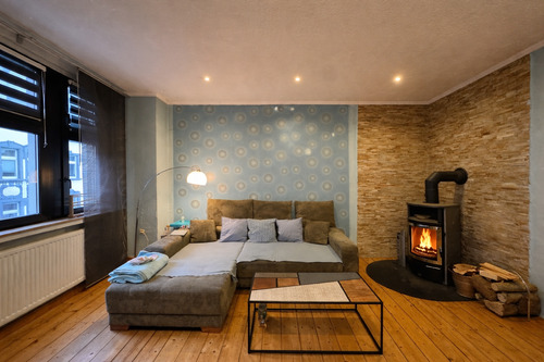 Wohnzimmer mit Kamin - Stilvolle Altbauwohnung trifft zentrale Lage - Großzügige ETW in Herne-Mitte