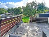 Terrasse mit Süd-Ausrichtung - EG-Wohnung mit großzügiger Süd-Terrasse, Gartenanteil und Garage
