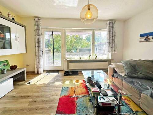 Wohnbereich mit Austritt auf die Terrasse - 2 Zimmer Terrassenwohnung zum Kaufen in Zirndorf