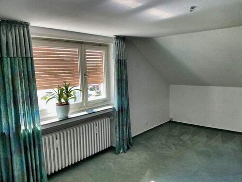 Wohnzimmer Dachgeschoß - Mehrfamilienhaus, Wohnhaus mit 198,00 m&sup2; in Herford zum Kaufen