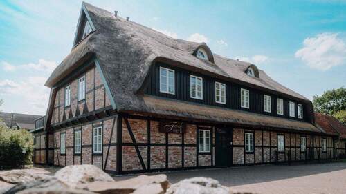 Außenansicht - 3 Zimmer Etagenwohnung zum Kaufen in Börgerende