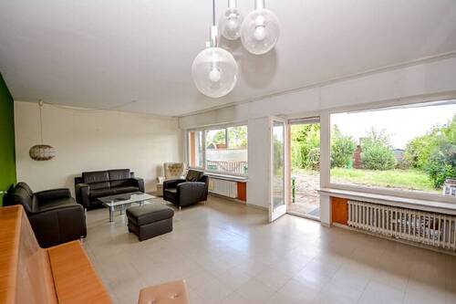 Wohnzimmer - 5 Zimmer Mehrfamilienhaus, Wohnhaus zum Kaufen in Brühl