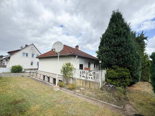 Terrassenansicht - Familienglück auf einer Ebene in gepflegter Wohnlage