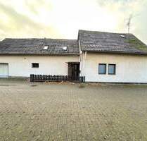 Sanierungsbedürftiges Haus mit großem Garten und Garage in idyllischer Feldrandlage - Langenfeld / Berghausen