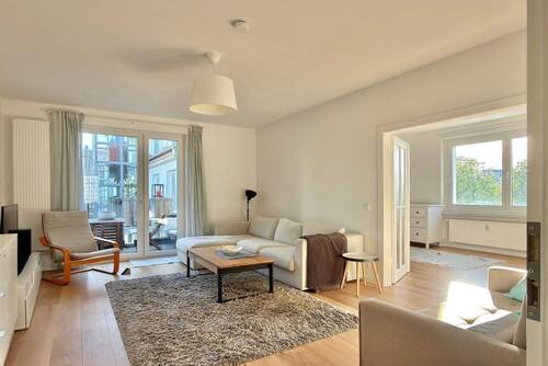 Wohnzimmer in der Abendsonne - 3 Zimmer Etagenwohnung zum Kaufen in Berlin