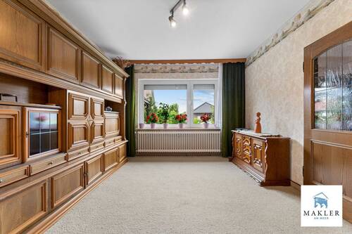 Wohnzimmer - Einfamilienhaus mit 147,00 m² in Aurich zum Kaufen