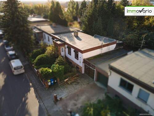 Ansicht Drohne - Sanierungsbedürftige Doppelhaushälfte im Bungalowstil mit großem Grundstück zu verkaufen!