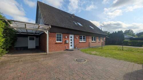 Eingang rechte DHH - 9 Zimmer Mehrfamilienhaus, Wohnhaus zum Kaufen in Tolk