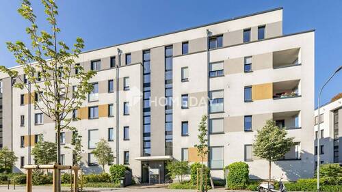 Außenansicht 1 - Modernes, barrierearmes 2-Zimmer-Apartment mit Balkon, Tiefgarage und Top-Anbindung in Langen